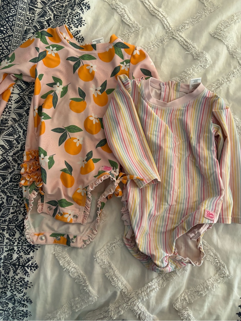 RuffleButts Pink Swim One-Piece with Orange Fruit Print